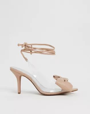 ASOS DESIGN Sylvie tie leg mid-heels with bow in beige and clear | ASOS (Global)