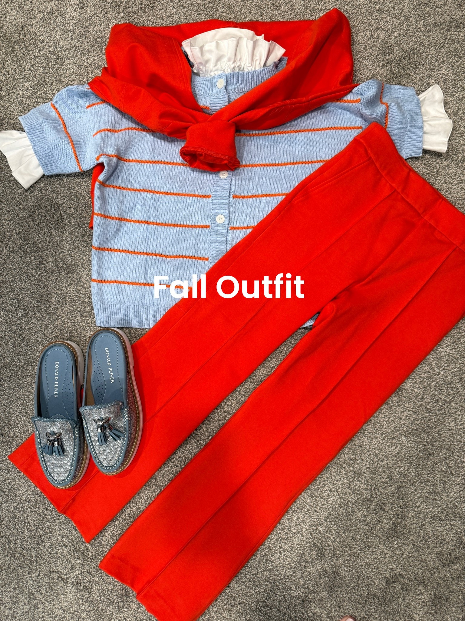 Fall outfit inspo
Over 50

Easy- classic and a fun color combo
Poppy and light blue 

Short sleeve stripe sweater cardigan. Tts and other colors available. 

Spanx poppy colored front seem Ponte pant tts I wear med - on sale 

Spanx sweatshirt in poppy for over the shoulders a great way to tie in that pop of color 
Spanx save 15%off with my code Deardarcyxspanx 

Ruffled collar and sleeve detail cuffs by
To look like a shirt underneath 

Light ble slip on loafers by Donald Pilner 
So comfy and tts 

Jewlery by Julie voz