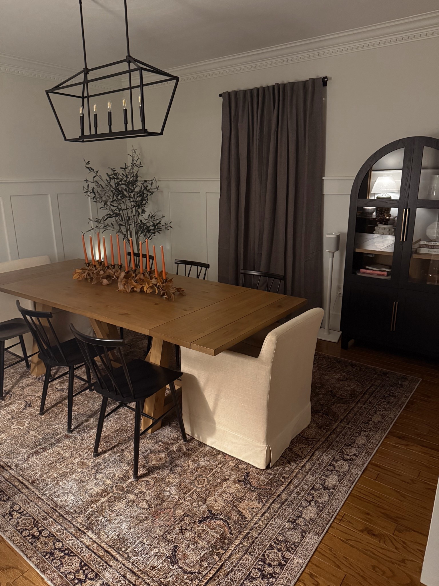 Moody + minimal fall dining 🍂🕯️ Cozy textures, warm candlelight, and a touch of drama — just the way I like it. Linked my rug, chairs, and similar candlesticks on my LTK! #diningroomdecor #ltkhome #fallvibes

#LTKHome #LTKSeasonal