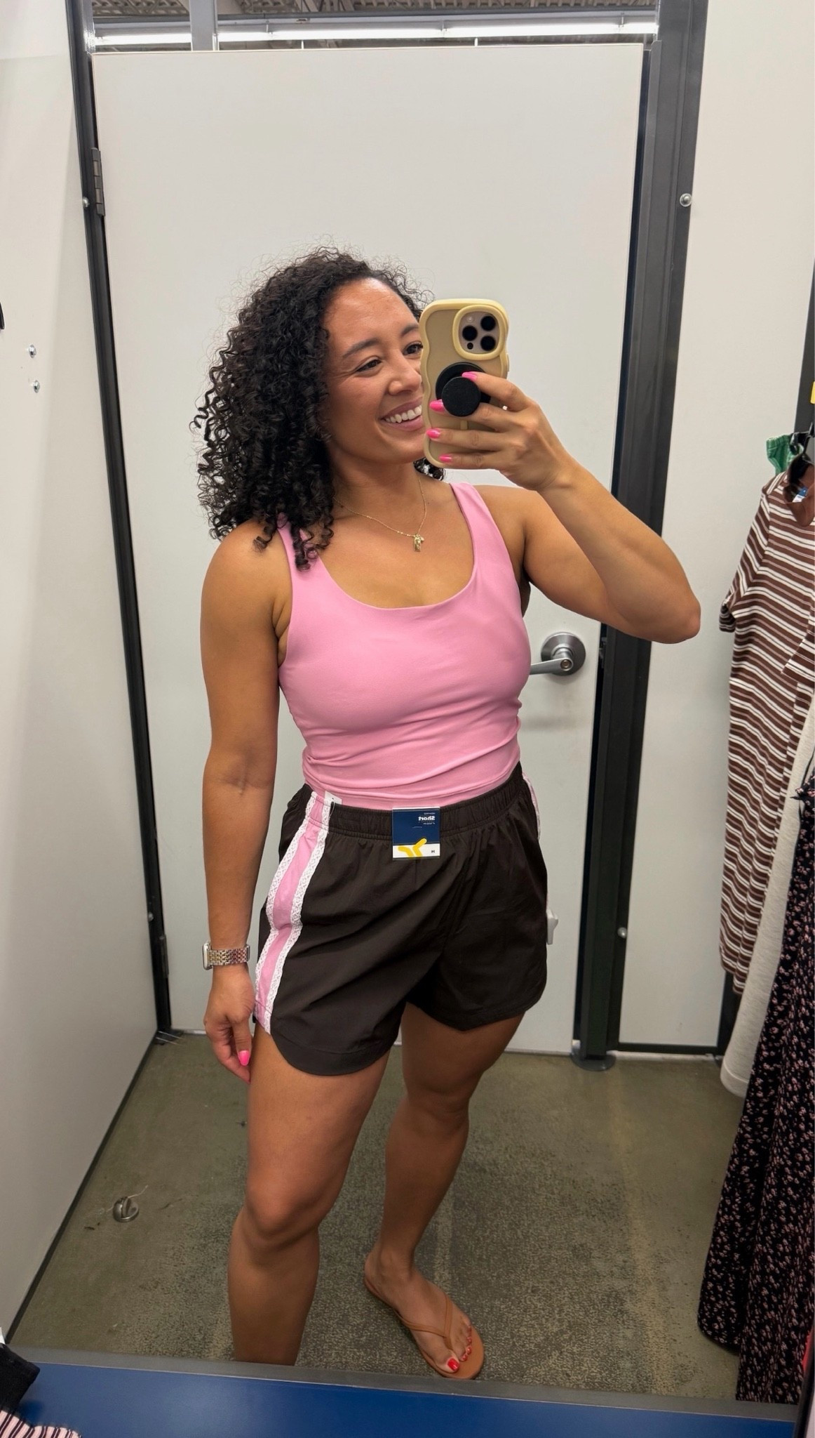 A simple outfit that still makes a statement! The pink tank adds the perfect pop of color, while the black shorts keep it versatile for everyday wear. Throw on sneakers or sandals, and you're set for errands, walks, or a casual day out.

#LTKdayinmylife #LTKgrwm #LTKootd