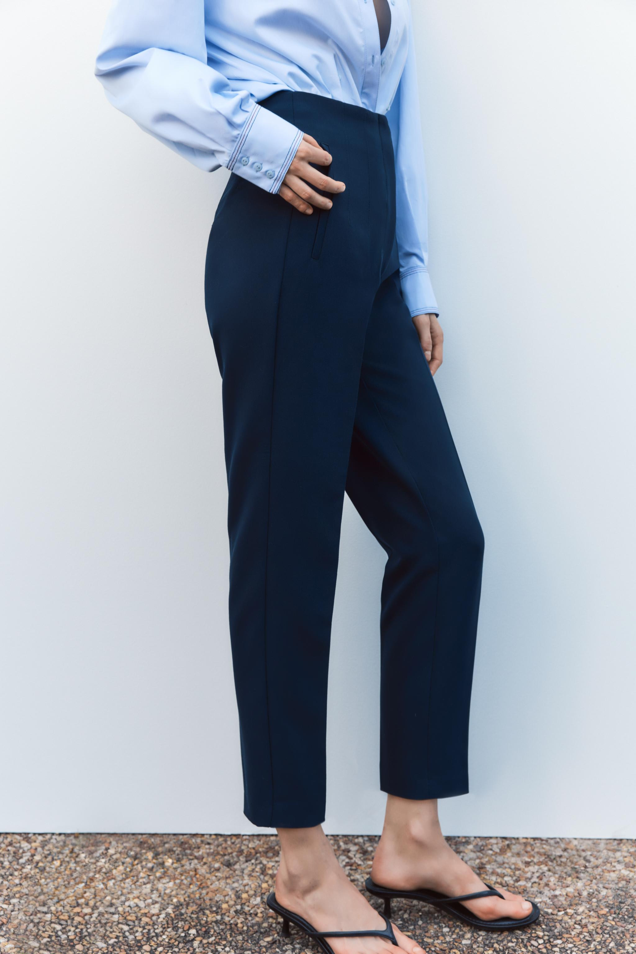 Pants with a high waist and pronounced seams at front and back. Front welt pockets. Front zip, me... | Zara US