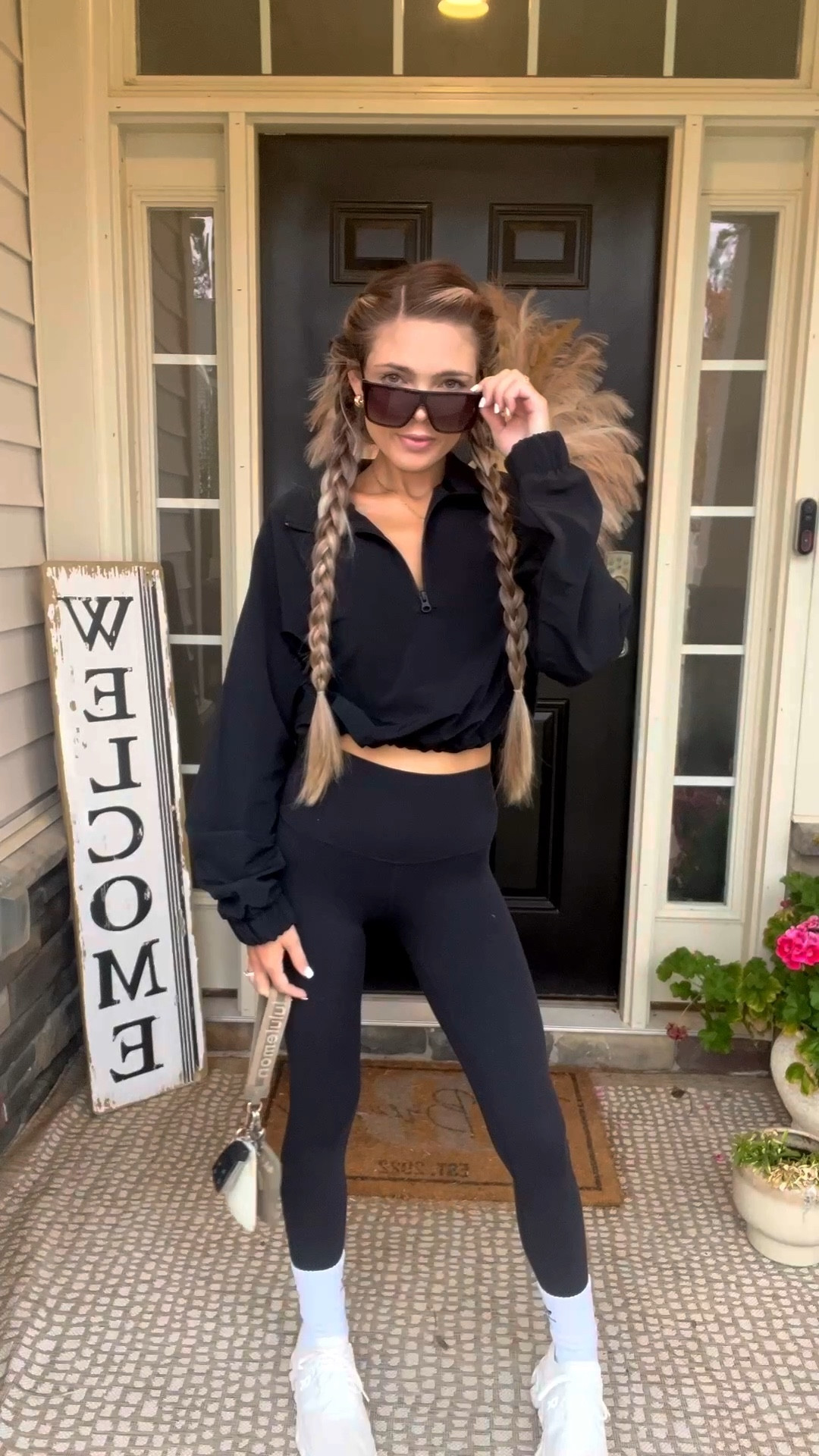 Current obsession: this new Alo windbreaker 🖤 Paired with my go-to black Lululemon Align leggings, statement socks, white sneakers, gold jewelry, wristlet & fav Quay shades—styled in seconds ✨ 

Windbreaker: Size Small
Leggings: Size 2

#LTKSeasonal #LTKPetite #LTKActive