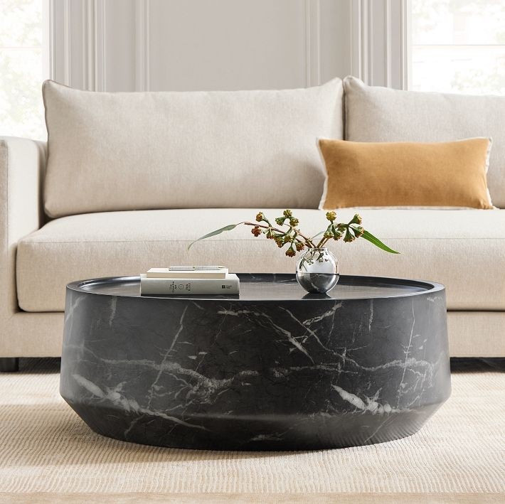 Alexander coffee table by West Elm

This table is made with glass fiber and reinforced with concrete composite. The black marble finish with the white subtle veining gives it a sophisticated look. Made by West Elm. 

#westelmfinds  

#LTKHome #LTKFamily #LTKU