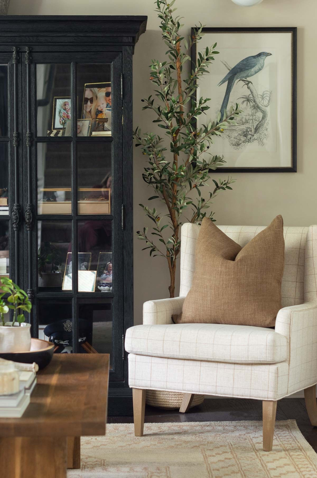 In our conversation room, I switch out some of the elements from time to time, like the corner accent chair and neutral area rug, but I always keep the room layout the same. home decor living room decor sitting room decor edgecomb gray walls black shiplap ceiling curio cabinet styling

#LTKHome #LTKSaleAlert