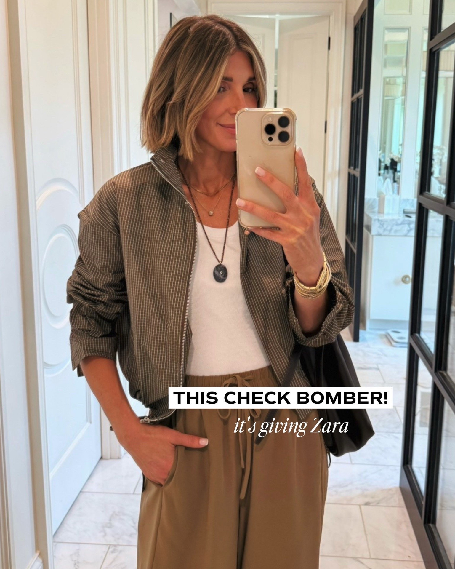 This check bomber jacket from Amazon gives Zara but is under $40! 🖤

#LTKootd #LTKSeasonal
