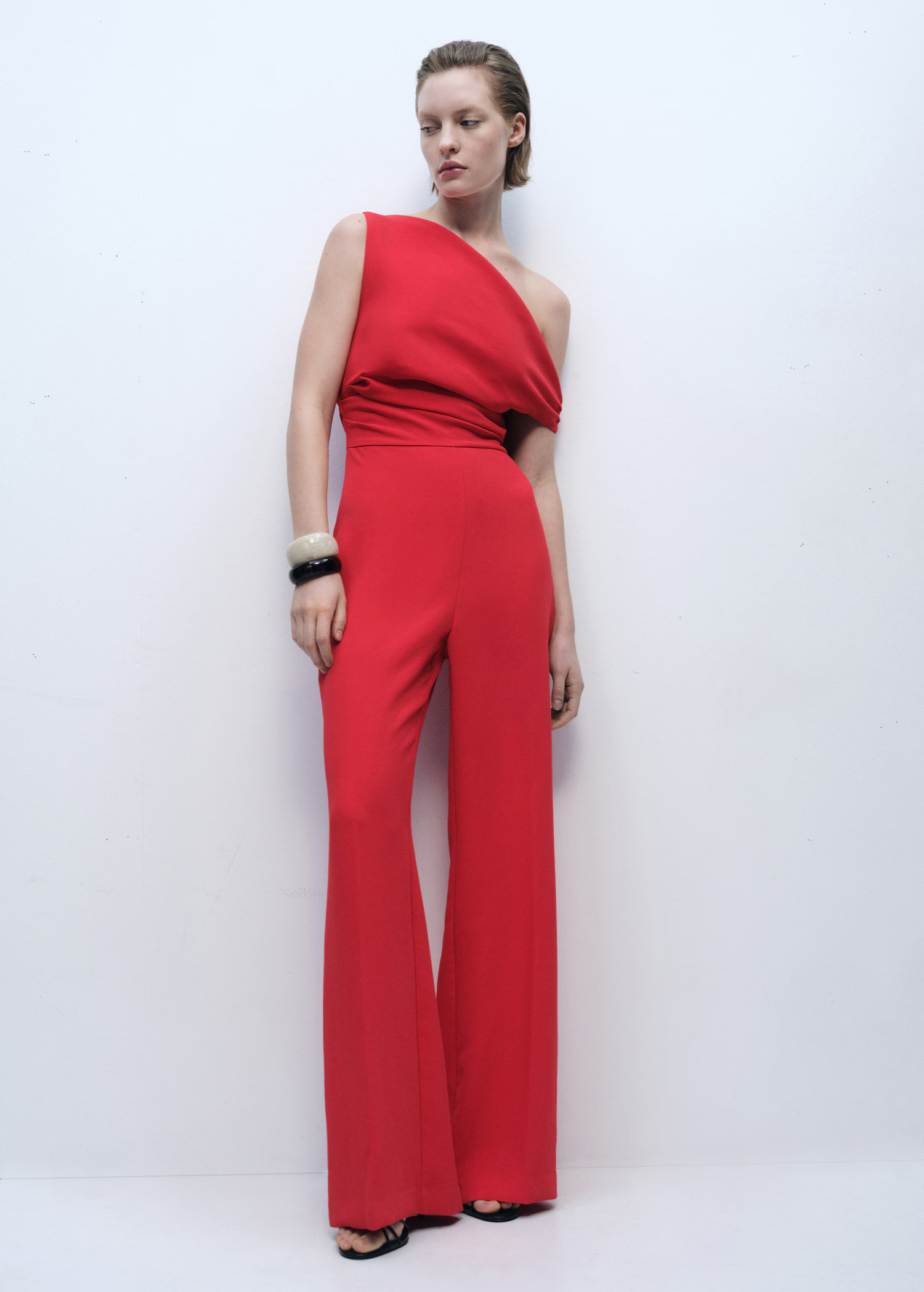 Long asymmetrical draped jumpsuit - Women | MANGO United Kingdom | MANGO (UK)