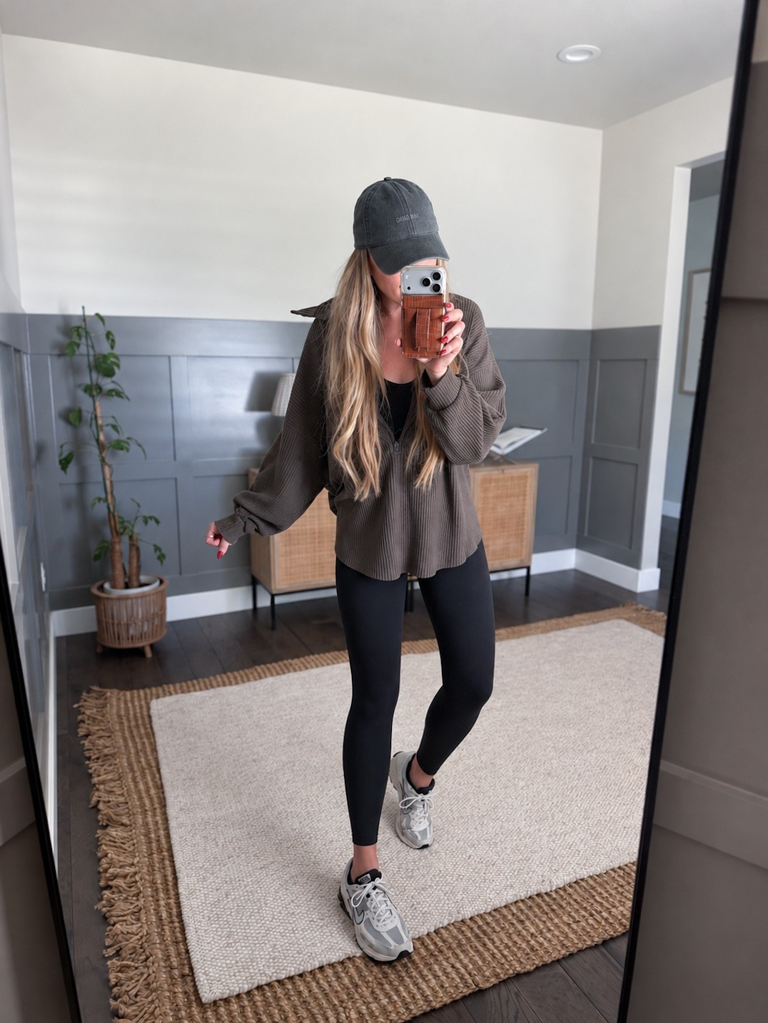 Tuesday pre travel errands, but make it feel a little more put together. Living in easy layers lately, & this is the perfect mix of sporty + comfortable. Finished with my favorite worn-in cap for an effortless off-duty look.

Tuesday outfit - errands outfit - elevated athleisure - casual fall outfit - fall outfit inspo - everyday outfit - sporty casual style - off duty style - mom style - neutral outfit - Joan Brown pullover - oversized pullover - Vuori leggings - Vuori activewear - black leggings - Nike Vomero 5 - neutral sneakers - everyday sneakers - baseball cap outfit - comfortable outfit - travel outfit - fall layers - athleisure outfit - casual street style

#LTKdayinmylife #LTKActive #LTKmomlife
