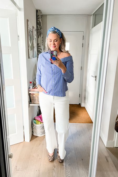 Ootd - Monday. Blue striped asymmetrical off-shoulder button down shirt paired with white trousers (G-Maxx, L). Leopard flats and a blue fringe headband. 

Vivaia, Stradivarius, casual work wear. 



#LTKstyletip #LTKover40 #LTKworkwear