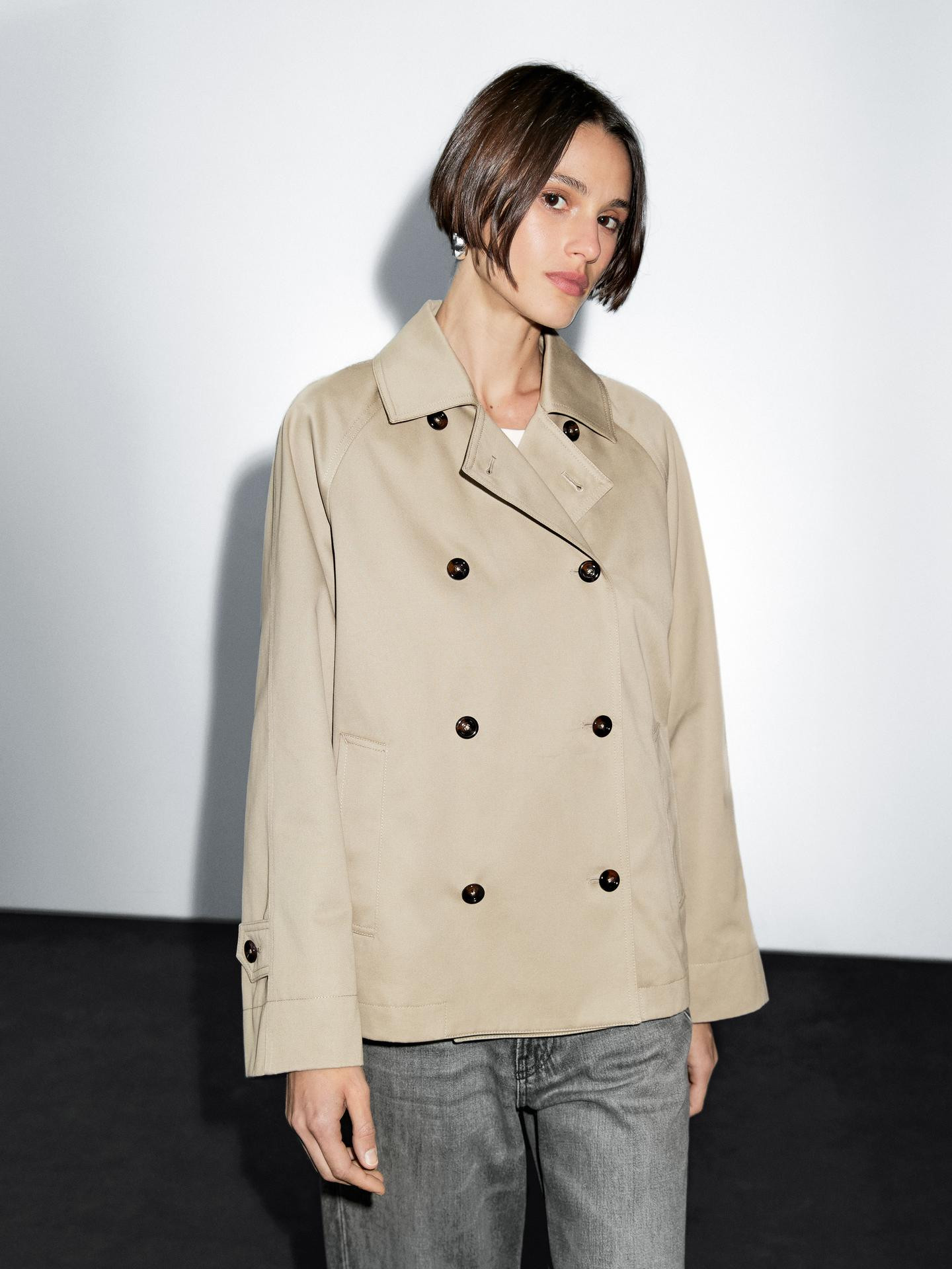 Short trench coat with button detail on the collar · Beige · Coats And Jackets | Massimo Dutti | Massimo Dutti UK