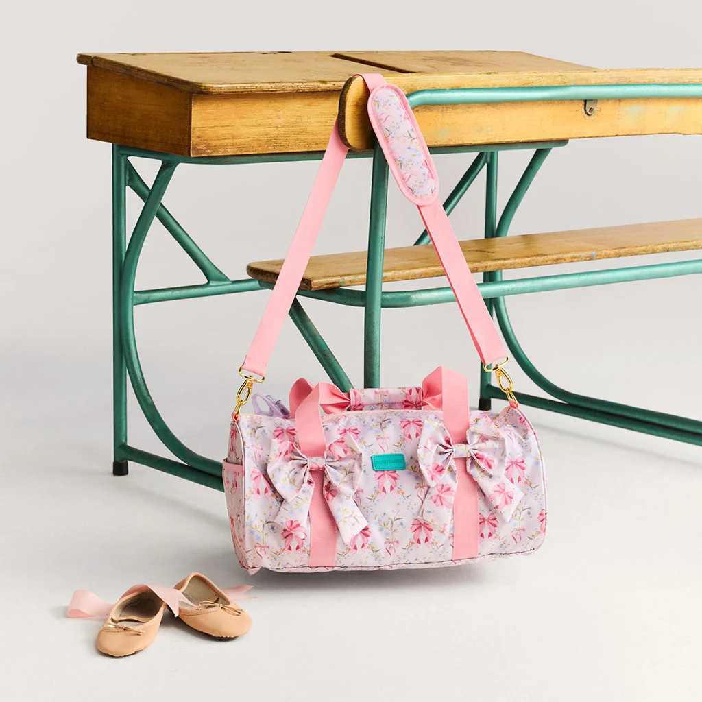 Bows Pink Reversible Harriet Double Bow Duffle Bag | Posh Peanut\u00ae | Posh Peanut