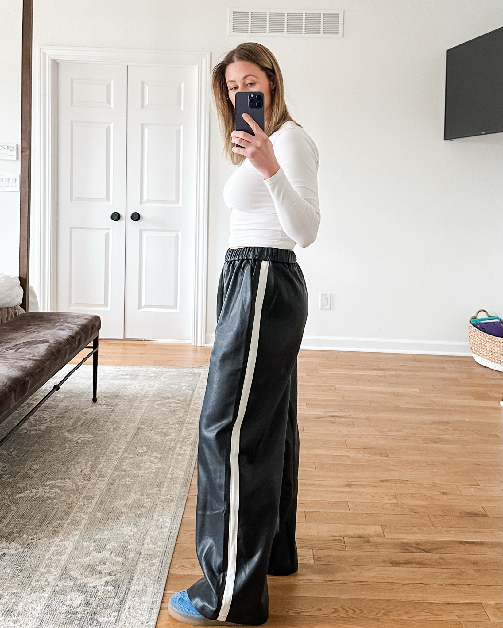 Ok totally freaking out over these…. Faux leather track pants. Seriously- so comfortable, but the faux leather makes them look so elevated! ￼

#LTKmomlife #LTKWorkwear #LTKootd