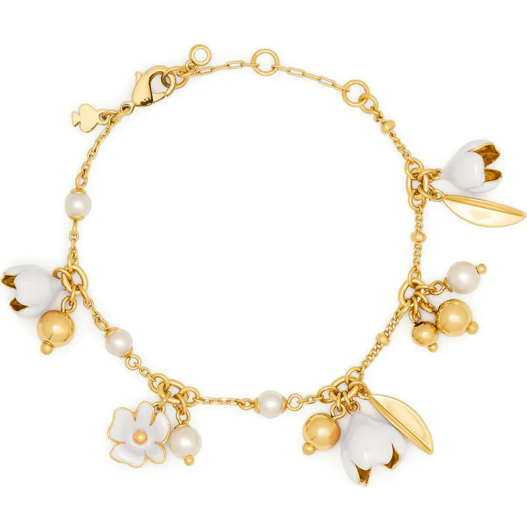 Kate Spade New York golden bloom flower charm bracelet in White. at Nordstrom | Nordstrom
