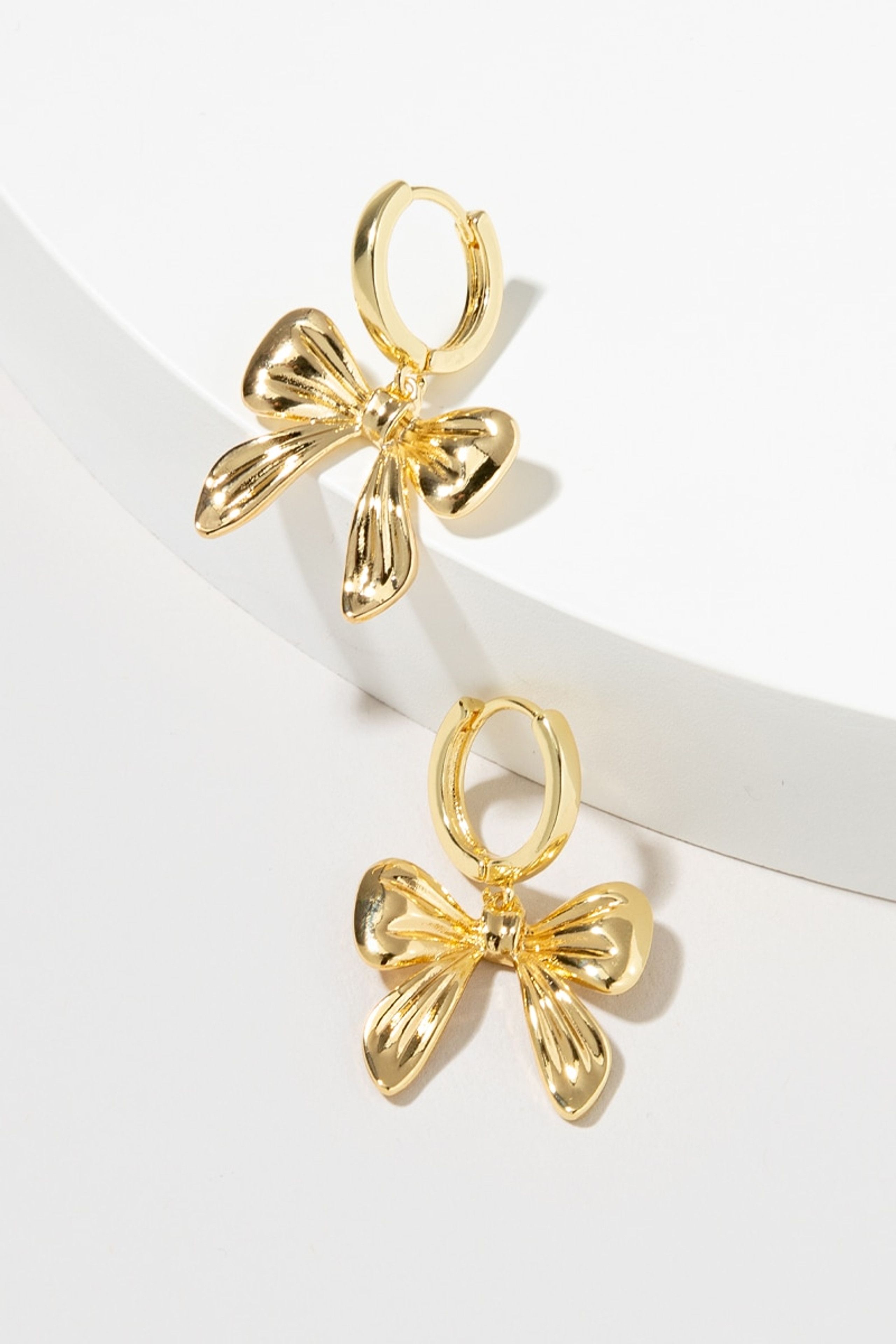 Shirlee Golden Bow Earrings | Francesca's