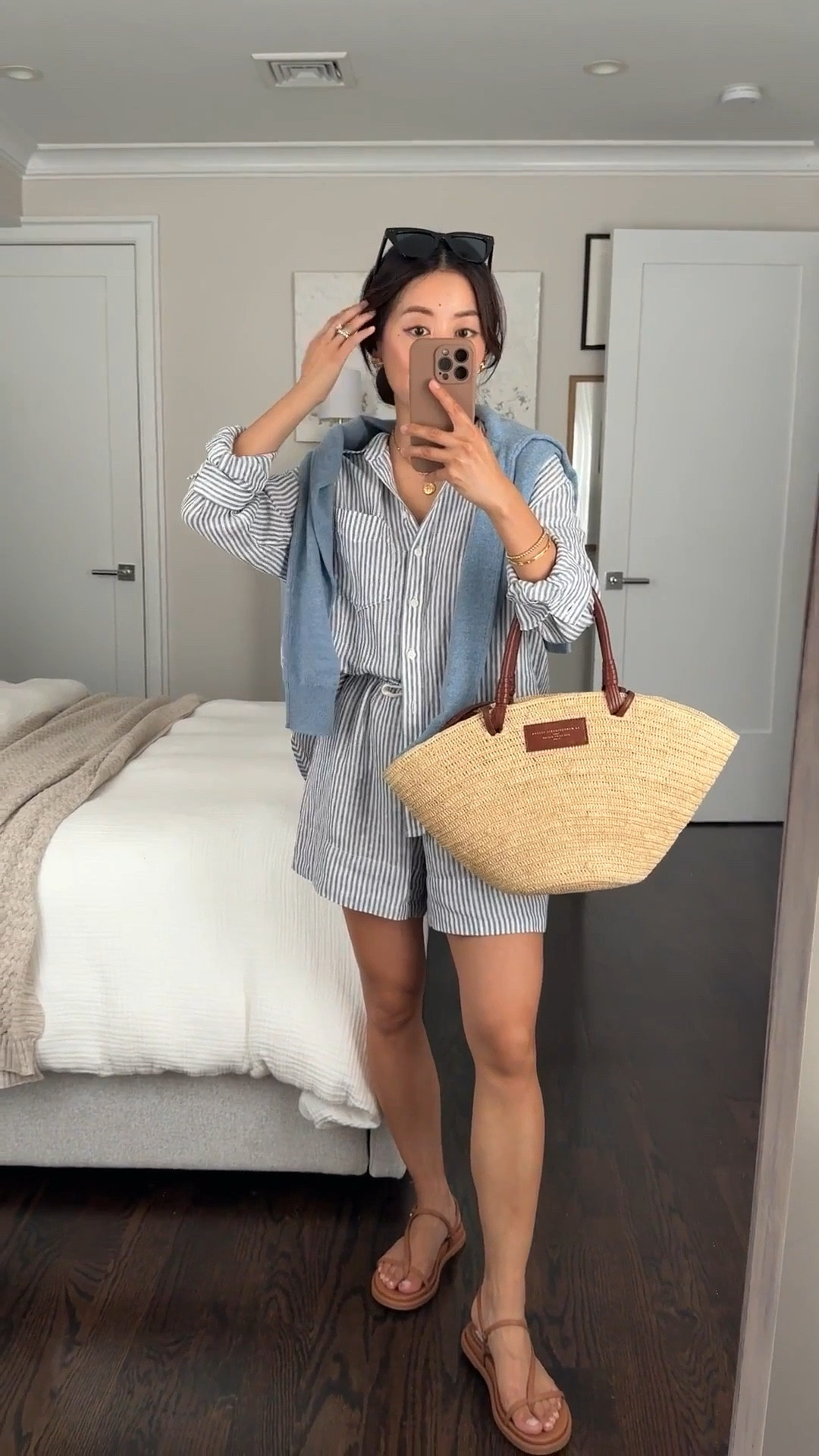 Gap linen set in XS petite. the shorts don’t come in petite this year, but the shirt still does. ￼

Can also be worn separately or open as a swim cover up. 

Gap Xs petite fits roomy on me, but are good quality versatile summer staples if your size is available or if you like an oversized fit like I do. 

• linen stripe shirt Xs petite is an oversized longer fit on me

• linen shorts Xs petite roomy fit. 
I also tried the xxs regular which fit me better and smaller at the waist but are about 0.75” longer in length than the petite.

• dolce vita sandals size 5

• sezane basket tote

Vacation style, linen outfits, matching sets, travel outfit

#LTKPetite #LTKTravel #LTKootd