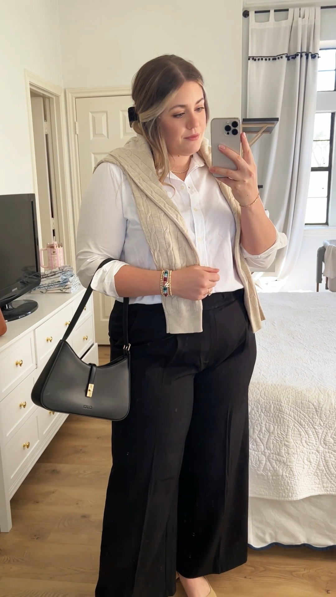 Classic, polished, and perfect for elevated workwear — this look is timeless but still feels effortless. A crisp white button-down, wide leg trousers, a cable-knit sweater draped over the shoulders, and chic cap-toe flats… it’s an easy way to feel put-together for the office or meetings without overthinking it.

classic workwear, preppy work outfit, elevated basics, wide leg trousers, white button down, cable knit sweater, cap toe flats, neutral outfit idea, office style, chic mom style, everyday elevated style, timeless wardrobe staples.

#LTKootd #LTKMidsize #LTKWorkwear