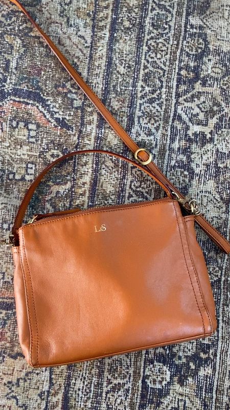 my absolute fave purse on super sale. cross-body strap and small strap. three pockets. (two that zip and one in the middle that snaps.) has held up so beautifully for seven years.

#LTKGiftGuide #LTKsalealert #LTKCyberWeek