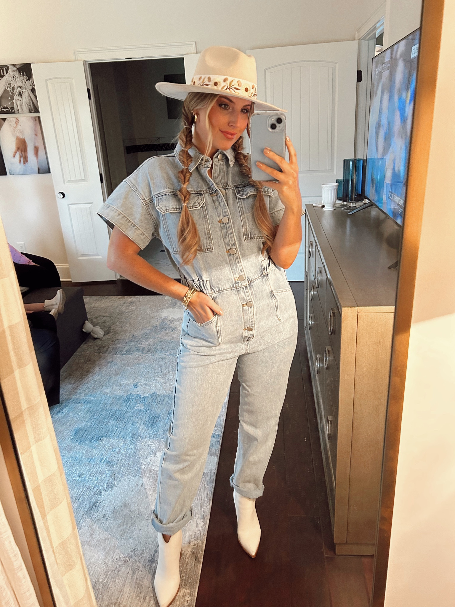 Denim jumpsuit, Nashville outfits, western outfit, white cream booties, western hat