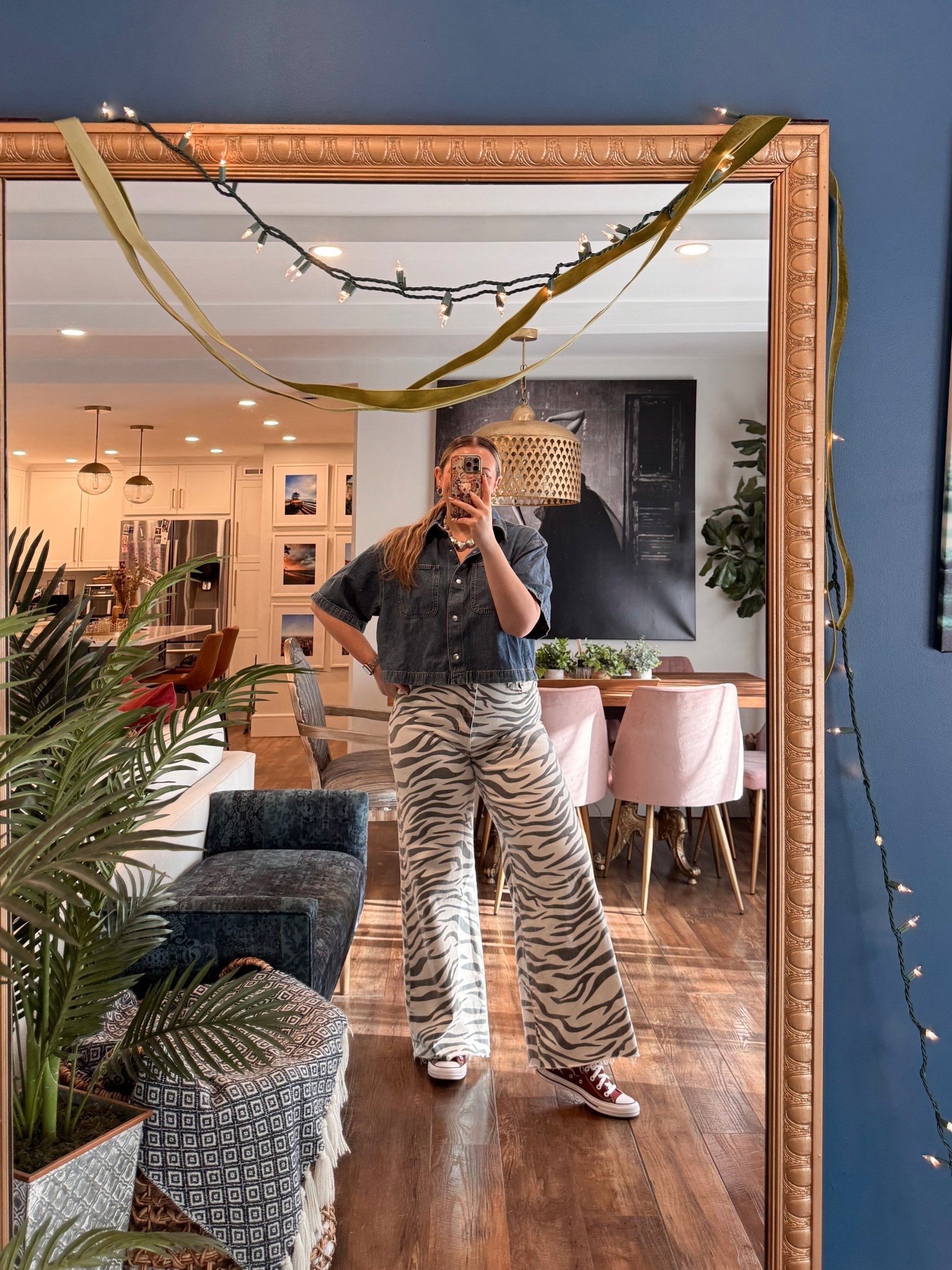 Spring outfits 2026. Obsessed with this funky Spring outfit! Madewell boxy airy denim short sleeve button up wearing a large for an oversized fit (currently on sale 25% off). Daze Denim Far Out High Waist Wide Leg Jeans in Zebra wearing a 31 but probably could've gotten a 30.  

 #LTKSpringSale #LTKootd #LTKMidsize