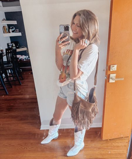 Oversized graphic tee from Walmart 

    But make her western styled 🤌🏼🌼

I am obsessed with this effortless look 

#LTKStyleTip #LTKFindsUnder50 #LTKShoeCrush