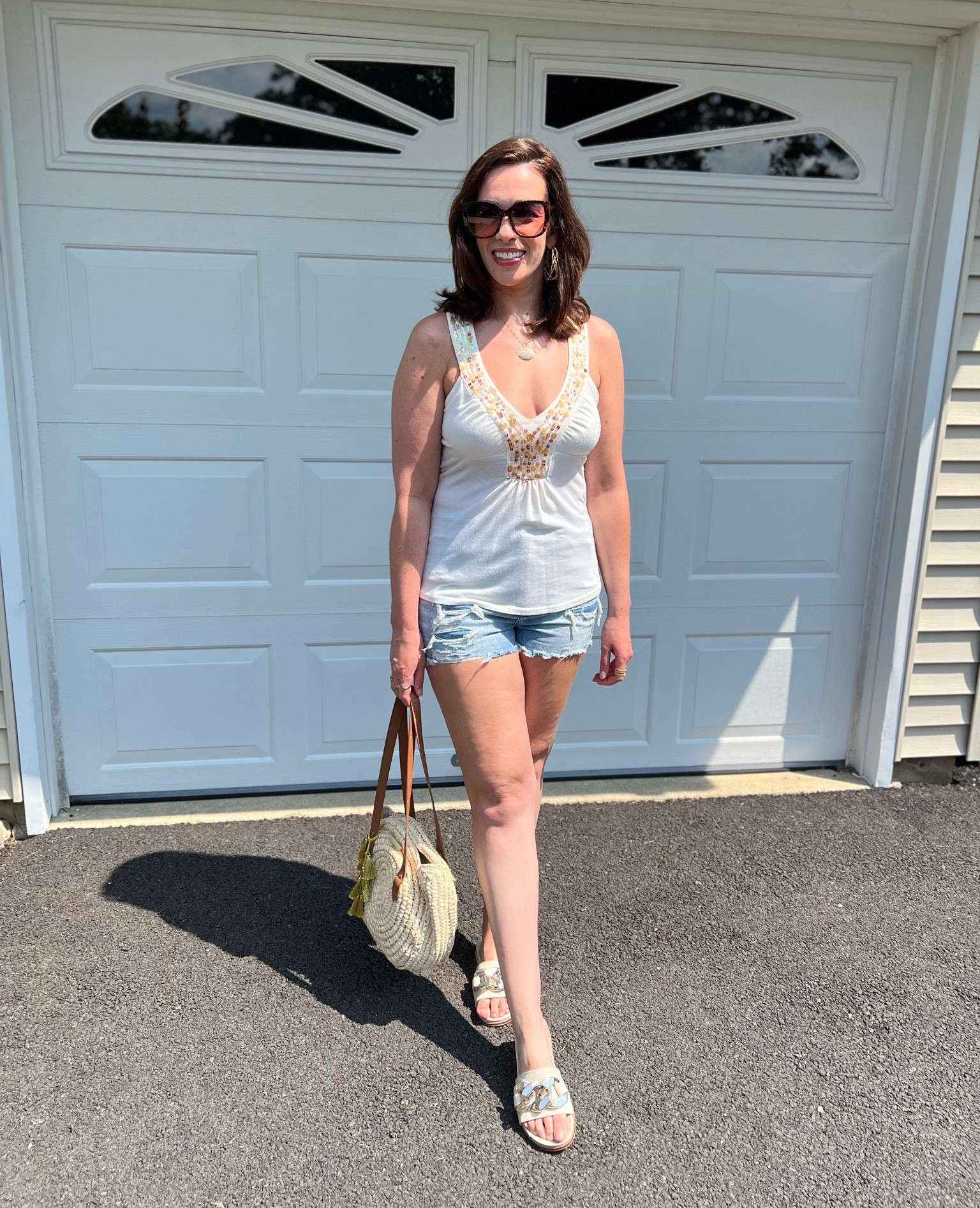 White embellished tank (size small). Light wash denim shorts (size 6). Beige sandals (size 8.5). #tank #tanktop #cami #embellishedtop #embellishedtank #denimshorts #shorts #jeanshorts #strawbag #bag #sunglasses #summeroutfit #summerstyle #casualoutfit 

#LTKSeasonal #LTKStyleTip #LTKFindsUnder100