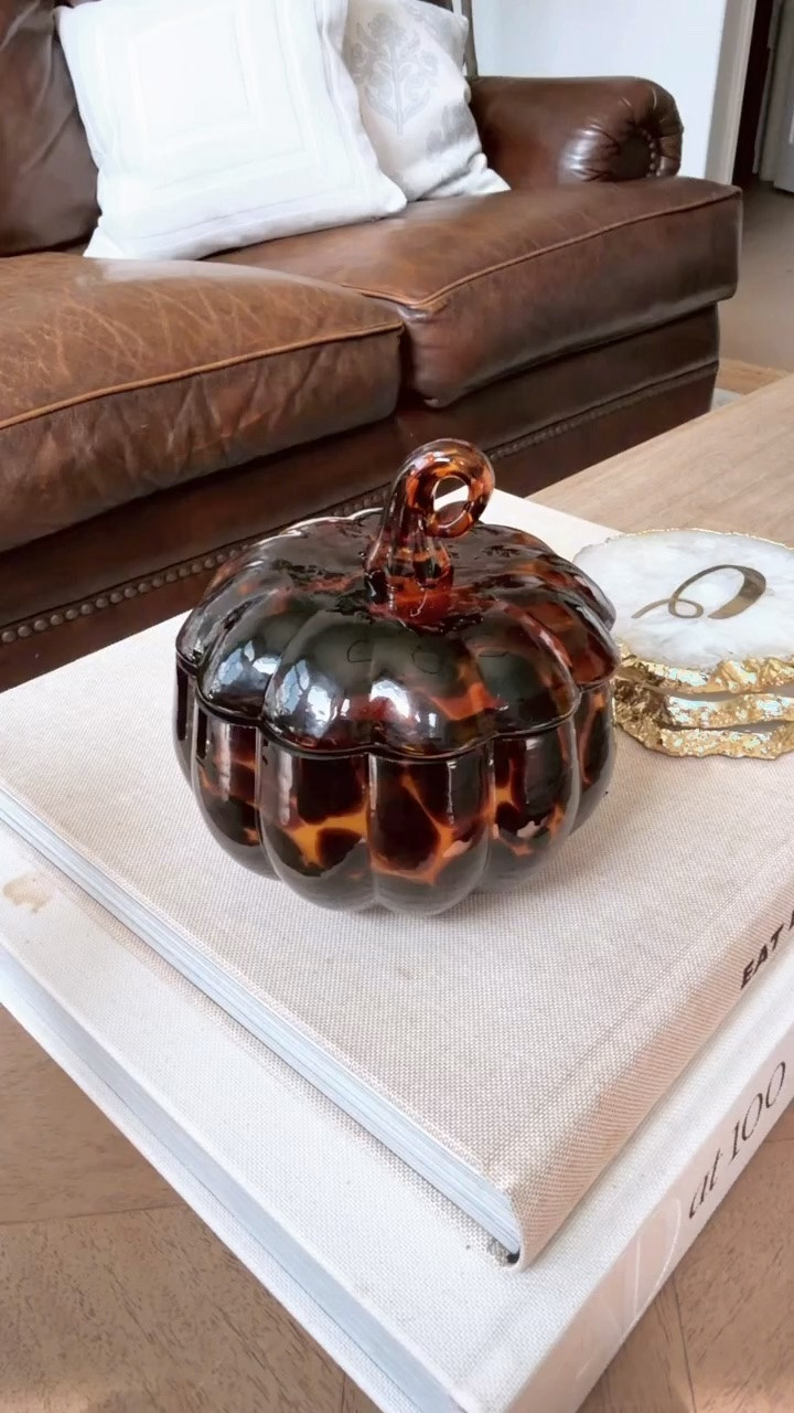 A little tortoise glass pumpkin is such a pretty way to bring fall into your home without going overboard. I love the rich brown tones styled on a coffee table, bookshelf or entryway for a subtle seasonal touch.

glass pumpkin, tortoise glass pumpkin, fall home decor, pumpkin decor, fall decorating, coffee table decor, bookshelf decor, autumn home decor, seasonal decor, brown home decor, fall home finds, HauteandHumid

#LTKSeasonal #LTKOver40 #LTKHome