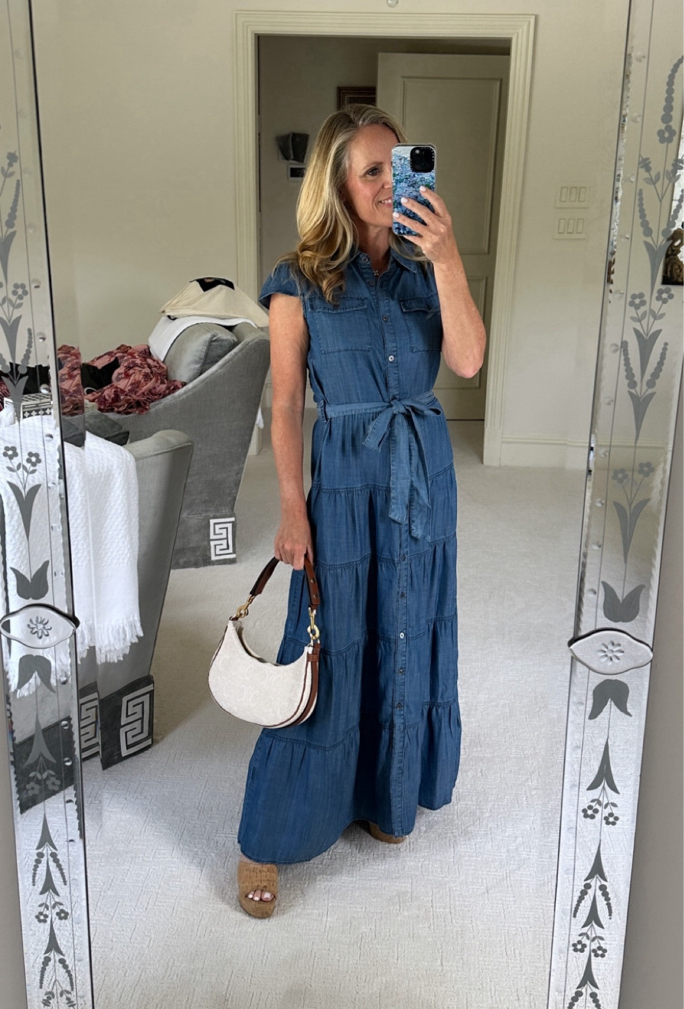 Tanya x Avara chambray maxi dress perfect for fall transition
Lightweight fabric with multitiered skirt and self  belt 
Fits ttts
I’m 5’2” tall with 4” wedges for length reference 

#LTKOver40 #LTKSeasonal #LTKStyleTip