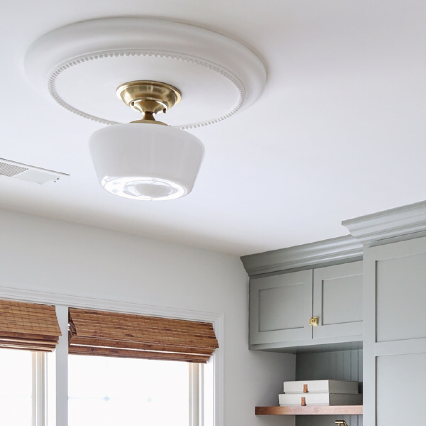 Upgraded the lighting in my office makeover.
Rustic farmhouse brass light fixture amazon 
Round ceiling medallion amazon 
Fabric linen storage box amazon 
Bamboo blinds in Hatteras Camel amazon 

#LTKfindsunder100 #LTKhome