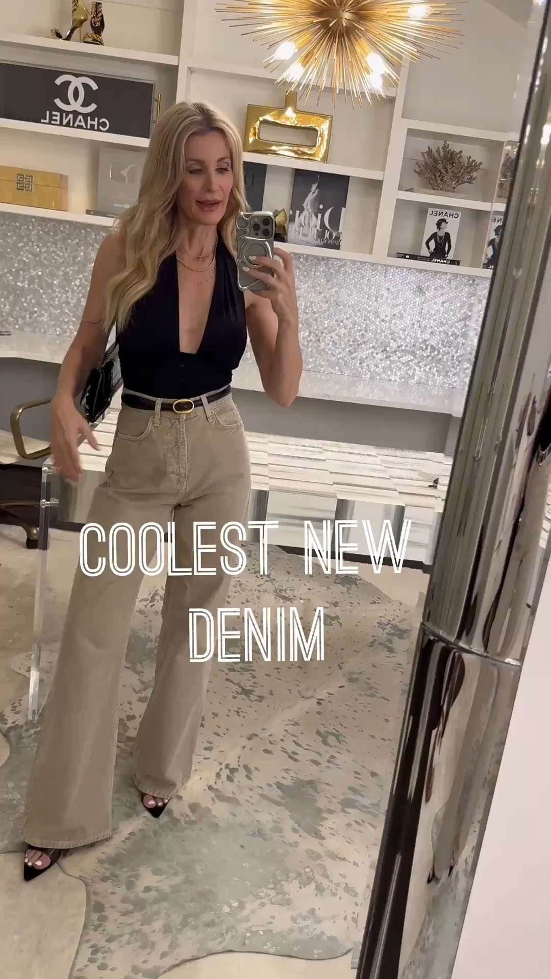 Neutral denim is having a major moment, and I’m here for it. 🤎 These high-waisted wide-leg jeans are incredibly flattering, and the soft tan shade makes them such a versatile alternative to traditional blue denim. Paired with this sleek black halter top, it’s the perfect outfit for a summer date night or evening out with friends. Fit details: True to size. Wearing an XS in the top and a 24 in the jeans. 

 

#LTKootd #LTKgrwm #LTKOver40