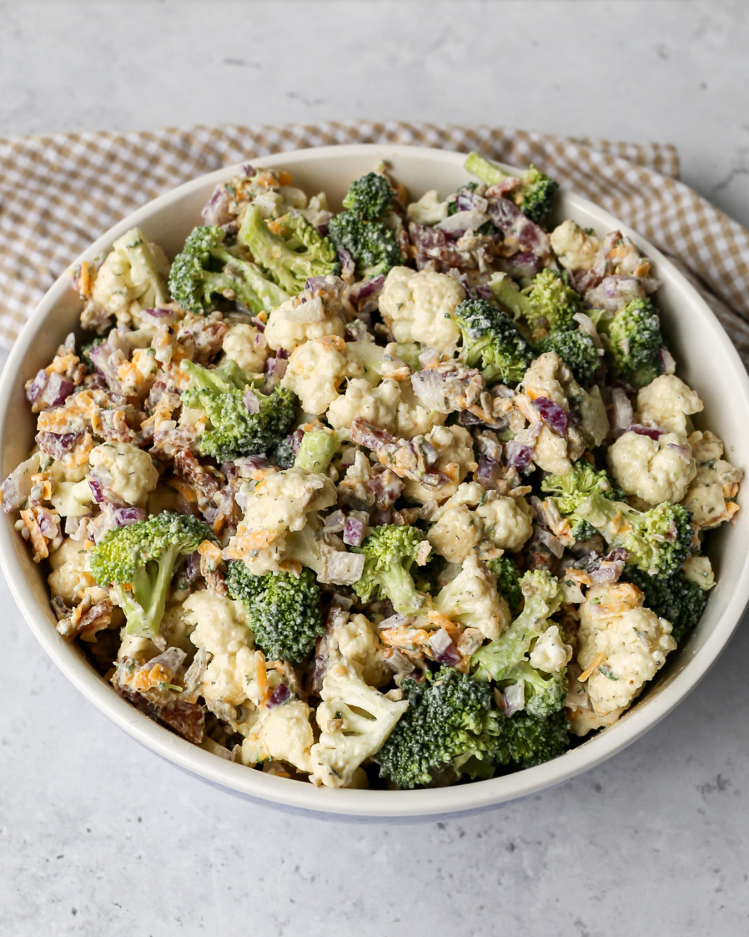Everything you need to make this High Protein Ranch Broccoli Cauliflower Salad is already in your kitchen lineup, and if it is not, now is a great time to upgrade. I use the Nordic Ware half sheet pan to bake the bacon to crispy perfection, the OXO mixing bowls to toss everything together, and the box grater for freshly shredded cheddar. The balloon whisk makes the homemade Greek yogurt ranch come together smooth and creamy every time. Tap to shop everything I used! 

 #LTKdayinmylife #LTKfoodie #LTKHome