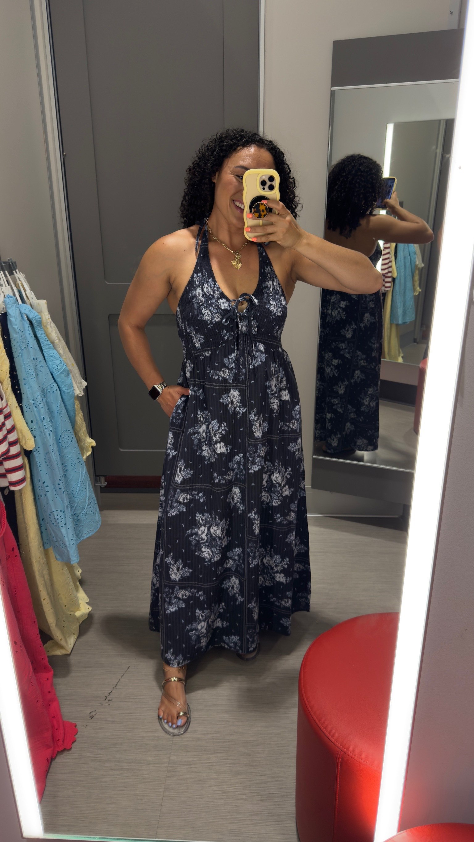 Run to Target because this gorgeous navy floral halter maxi dress is on sale for under $25 right now 😱! It has the prettiest lace-up detail at the front, a super flattering empire waist, and it even has pockets. 

 #LTKgrwm #LTKootd #LTKSaleAlert