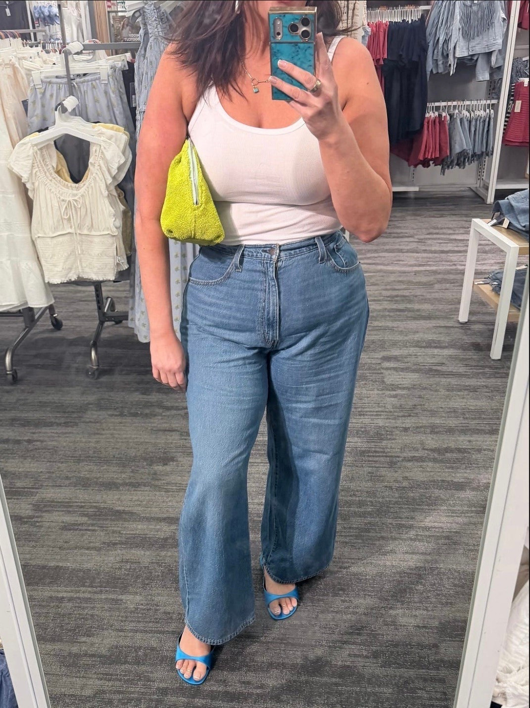The official White Tee + Jeans + Something Silly Formula™, as seen here: Reformation x Courtney Grow bag and sandals, Amazon white tank, and Levi’s currently 30% off.

#LTKMidsize #LTKSaleAlert #LTKootd