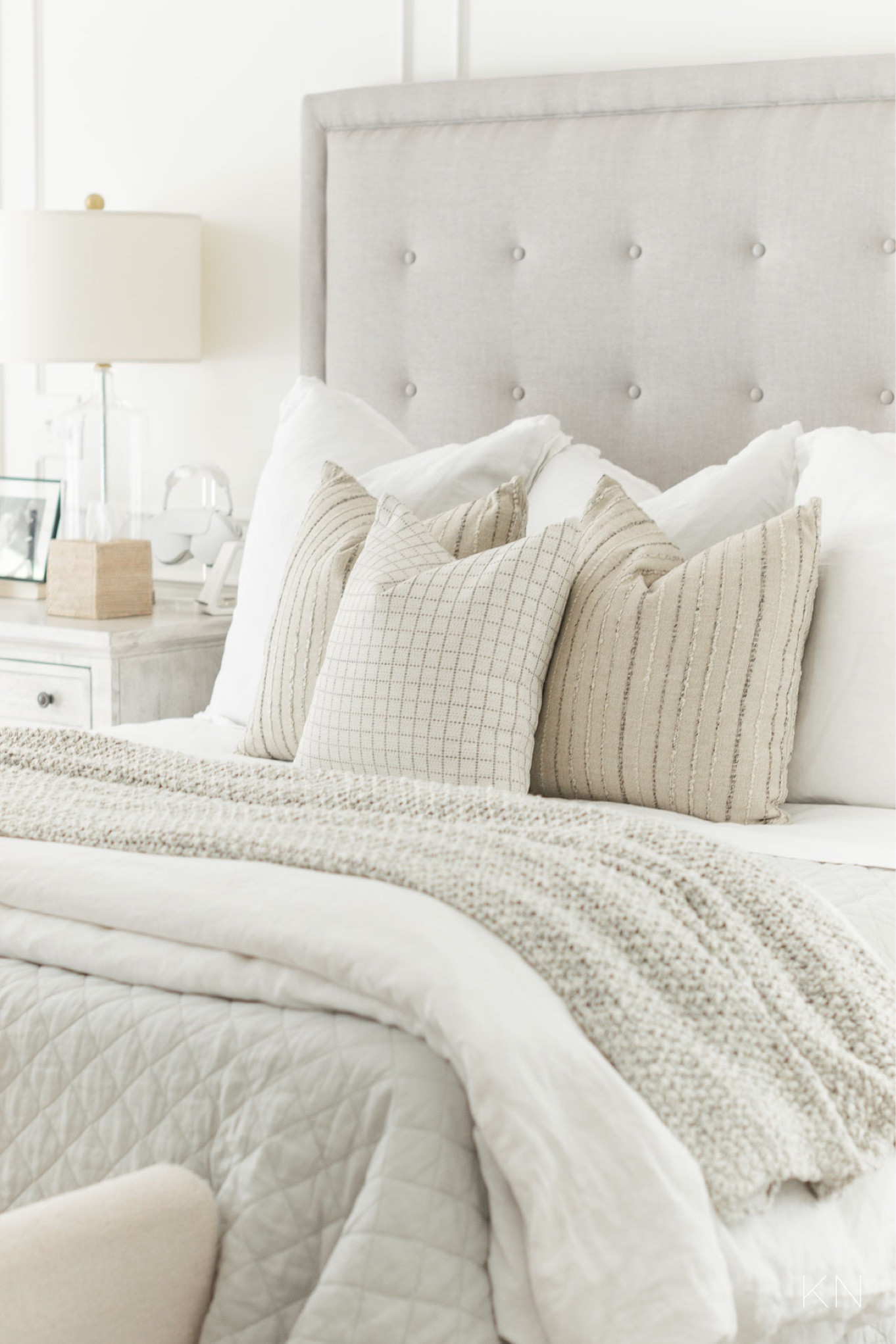 An easy and affordable way to update your bedroom decor is to switch out your bedding or even just your throw pillows. home decor bedroom decor neutral bedroom striped pillow linen quilt glass lamp#LTKStyleTip

#LTKHome