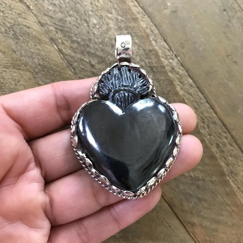 Black horn fire heart pendant, handcrafted, Nepalese, Tibetan repousse silver, 67X41 mm | Etsy (US)