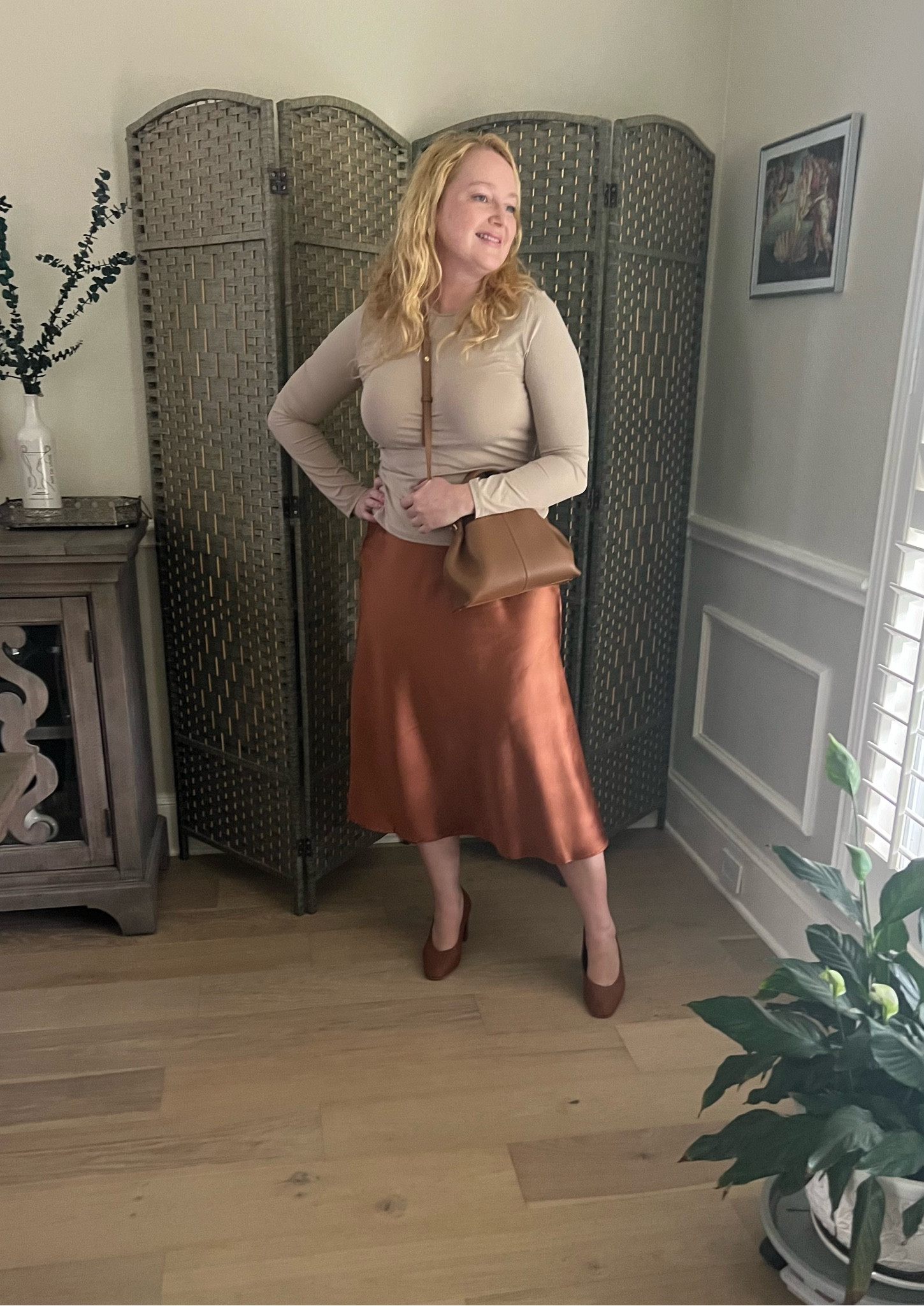 Feminine fall look
Silky skirt, beige long sleeve top 
Brown accessories 
Polène bag

#LTKfindsunder50 #LTKSeasonal #LTKmidsize