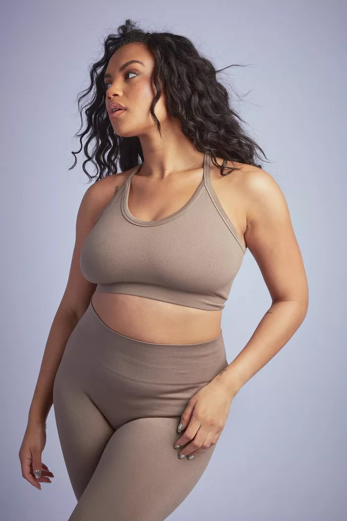 Plus Seamless Rib Plunge Cross Back Sports Bra | boohoo (US & Canada)