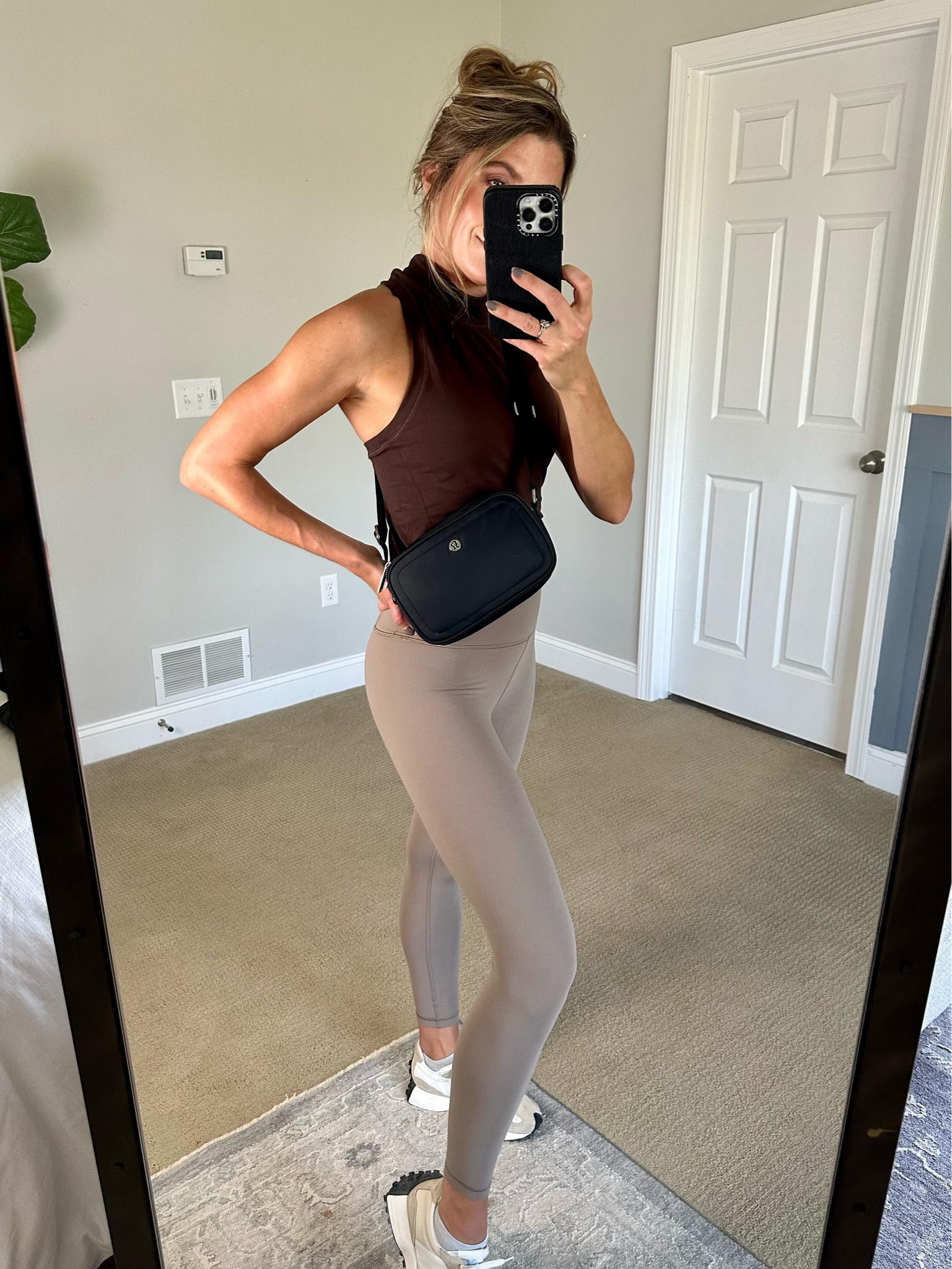 This top is so flattering w/the high neck line and slim waist🙌🏻 And layering shades of brown is my new go-to.🤎 These leggings are BUTTER.

#LTKstyletip #LTKover40 #LTKfitness