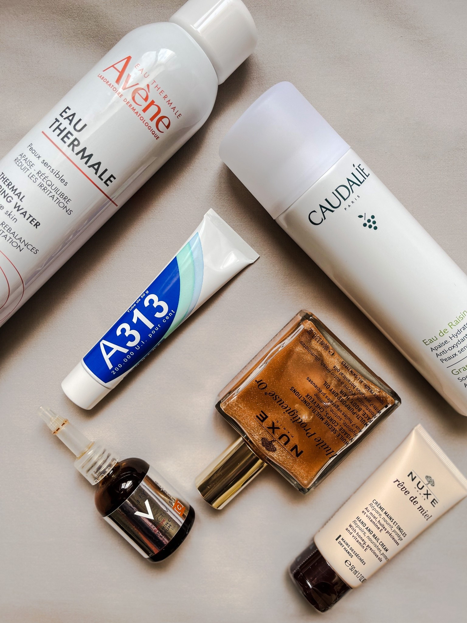 My Top Must-Have French Pharmacy Skincare Products 🥰

1. Caudalie Grape Water: is an absolute must-try, and can be added to any skincare routine. I’ve been using this product for 13 years and swear by it. It is packed with antioxidants that soothe, hydrate, and reinforce the skin barrier. Can be used on all skin types, including sensitive skin.

2. A313 Retinol Cream: is a skincare gem! This retinol cream is made from 100% retinyl palmitate, a gentle retinoid. This thick cream boosts collagen production, and locks in moisture. It’s a great addition to your nighttime routine, especially if you’re new to retinoids or have experienced irritation from retinoids in the past. 

3. Nuxe Hand and Nail Cream: deeply nourishes and repairs dry, damaged skin. It penetrates immediately and doesn’t leave a greasy feel. Out of all the hand creams I’ve tried, this works best to relieve dryness. 

4. Avène Thermal Water: is an absolute must-have.  This thermal spring water is packed with trace elements that work to soothe, rebalance irritated skin. Great for sensitive skin types, after makeup, or during hot weather. 

5. Vichy LiftActiv Vitamin C Serum: contains 15% pure vitamin C , vitamin E, and pycnogenol. This powerful antioxidant serum brightens, and protects against UV rays, plus environmental aggressors.

6. Nuxe Huile Prodigieuse Or: this lightweight shimmer oil contains 7 botanical oils. It can be used on the face, hair, or body. Fast absorbing, and doesn’t stain clothing. Plus it gives your skin an amazing glow. 

#LTKU #LTKBeauty