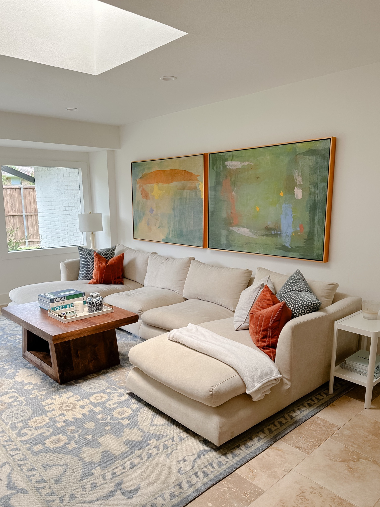 Living room, couch, lamp, wall art, oversized art, white couch, sectional, side table, colorful living room, home decor, living room decor

#LTKunder50 #LTKhome #LTKunder100