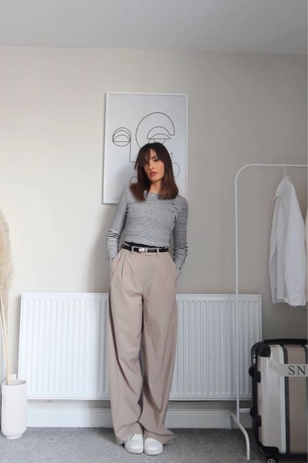 Striped long sleeve top, beige formal trousers, black belt, white trainers 

#LTKeurope #LTKstyletip #LTKSeasonal