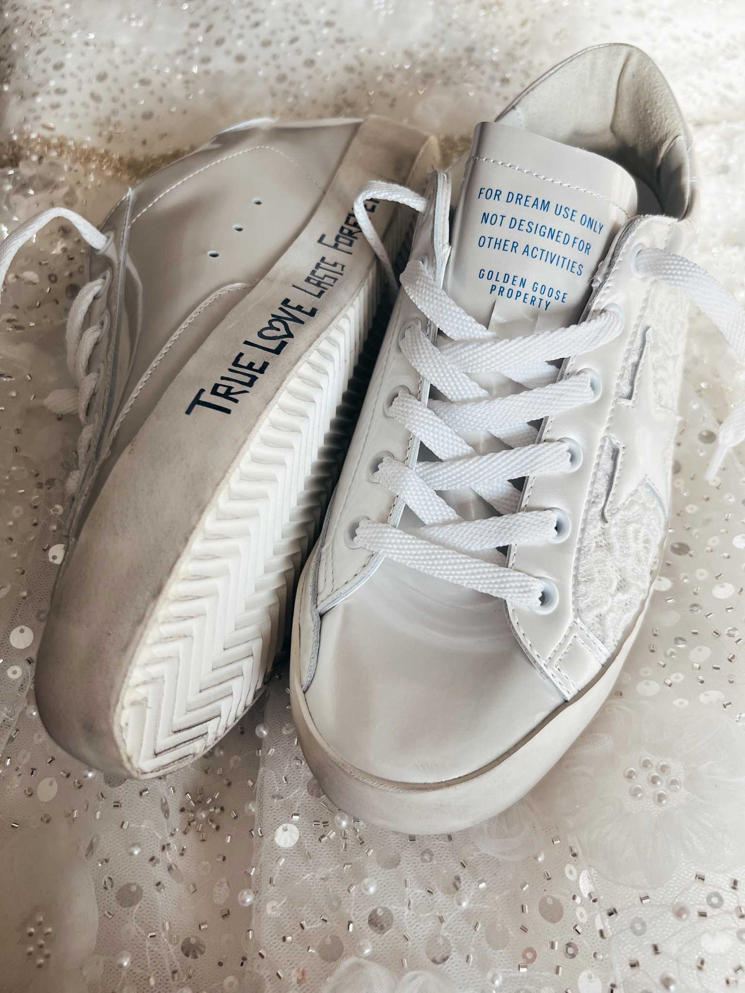 Let’s Talk Wedding Reception Shoes! 

If I’m going for comfort, I am a sneaker kind of gal through and through - so when the time came to figure out what shoes I wanted to wear for my wedding reception I knew I needed a sneaker that’ll be comfortable enough for me to be on the dance floor all night. Bingo……I’d have to go with #goldengoose  
These beauties are the Super-Star Low Top Nordstrom exclusives that I’m pretty sure are meant for bridal events!  But what I love about them is that I can wear them anytime after the wedding. It’s not so specific to where I’d only be able to wear for special occasions. My favorite part is the “true love lasts forever” on the side🥰 
Yes, I do understand why people tend to not like golden goose (expensive for shoes that come looking “dirty”), but please trust me when I say they are the comfiest sneaker I have ever worn (I now have 4 pairs)  AND they do have styles that don’t come looking  like you’ve played in a pile of dirt. 

Interested in the look, but not he price tag? Check out a few of my favorite alternatives! 🤍 



#LTKwedding #LTKstyletip #LTKshoecrush