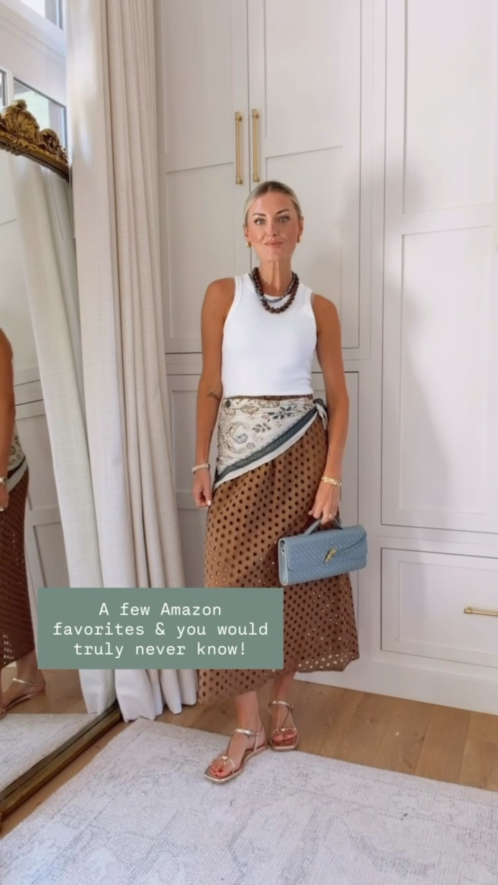 This brown skirt I actually have had in two other colors and loved! Thought this brown would be so pretty for fall! Wearing S!

Loverly Grey, Amazon, brown skirt, fall outfit, white tank, ribbed tank, satin scarf, scarf styling

#LTKSeasonal #LTKootd