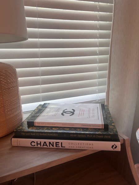 Nightstand books
Rattan lamp 
Chanel book
The lost book of herbal remedies 

#LTKHome