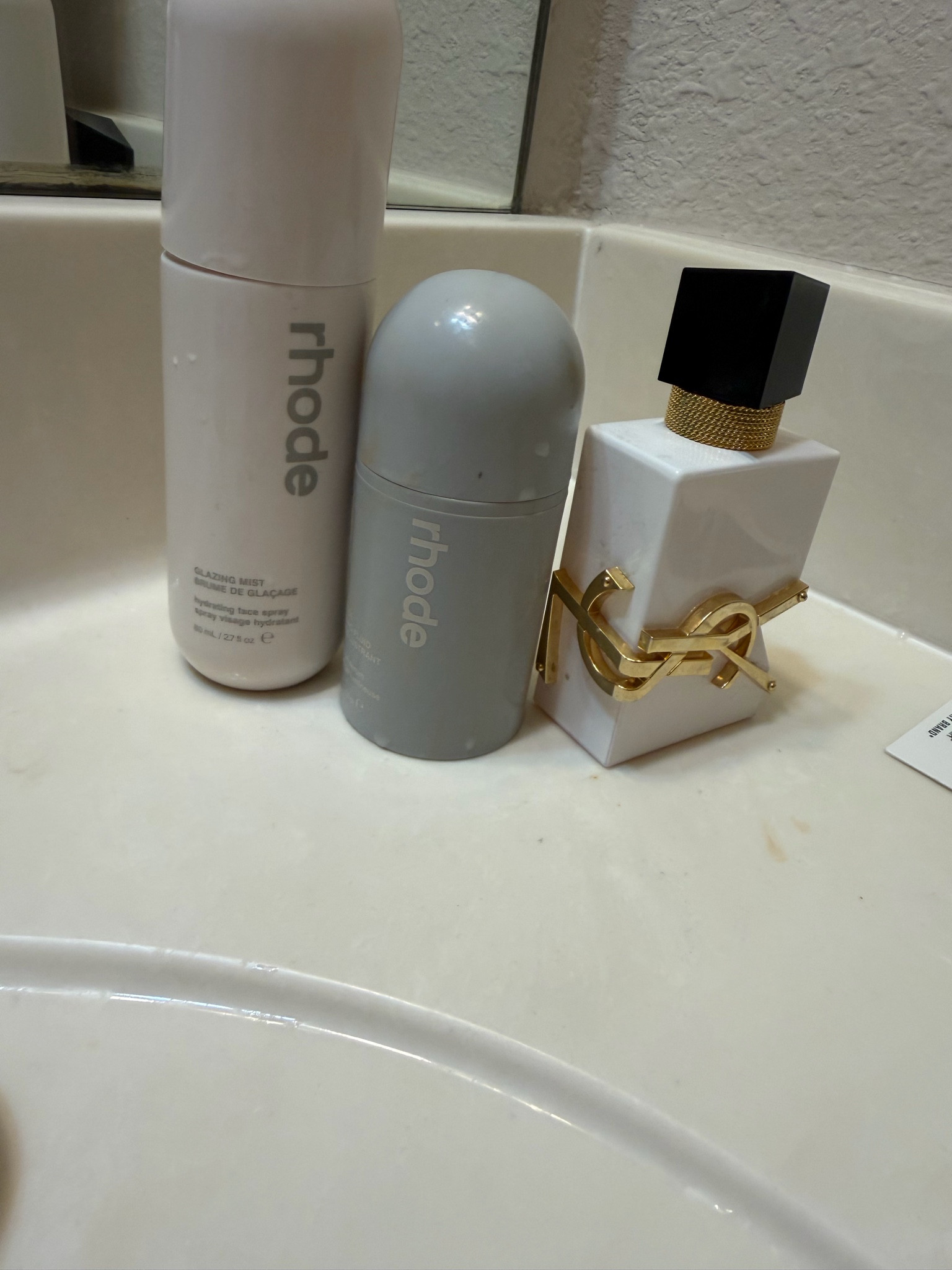 My most used beauty products in my bathroom right now I travel everywhere with my Rhode glaze and YSL perfume it’s so good  

#LTKgrwm #LTKmorningroutine #LTKselfcare