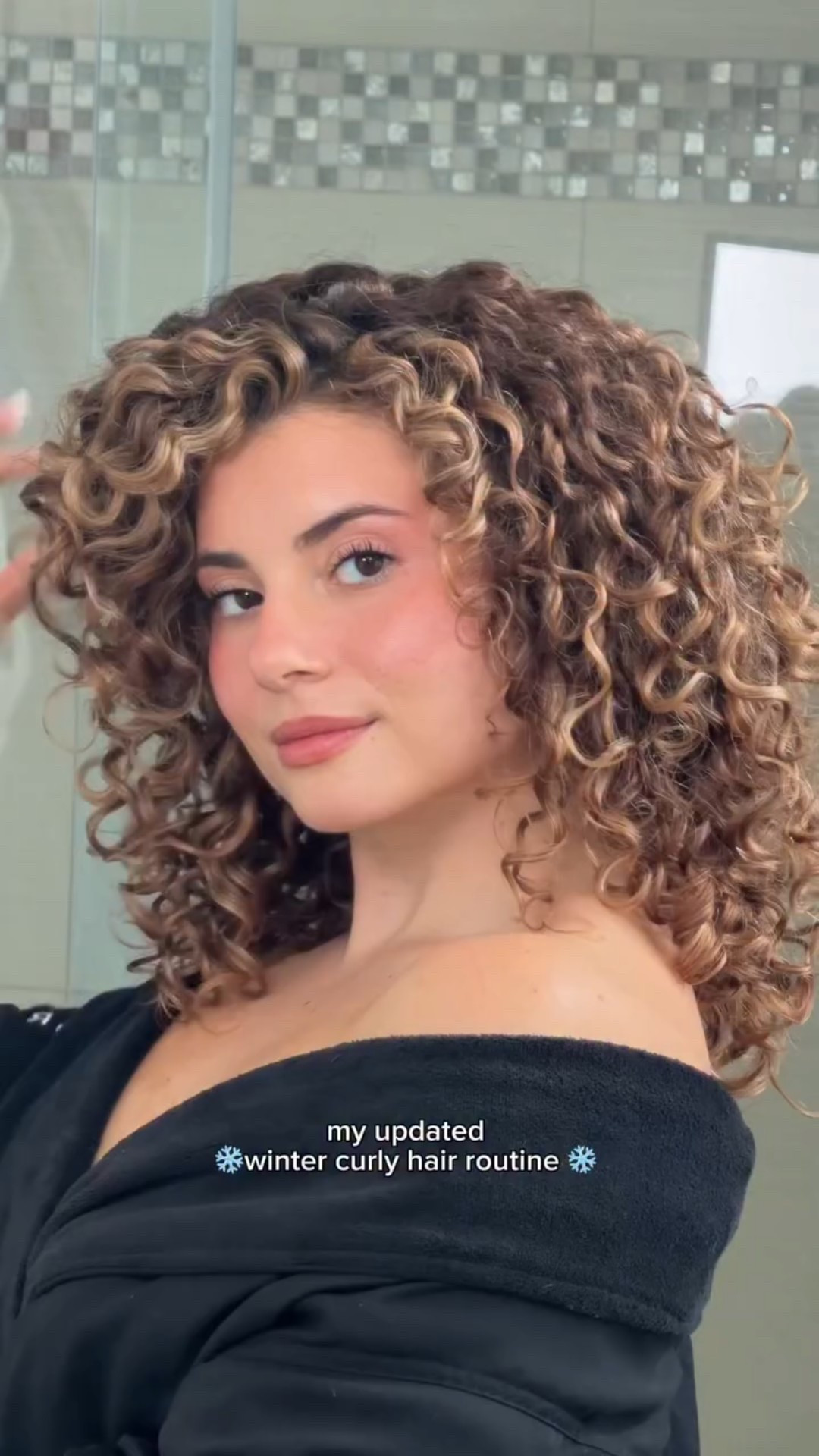 my updated winter curly hair routine on my shorter hair❄️✨ comment ROUTINE and I’ll send you a link to all the products used and more info on why I use each product below🫶🏼

1. Scalp serum: my scalp gets drier in the cooler weather so using a scalp serum like this that contains hyaluronic acid to lock in moisture and glycolic acids to tone and balance really helps with the flakes and itching. 

2. I never skip using a leave in conditioner that has atlessst 450 degree heat protection to protect my hair from the dryer! 

3. I have thick course hair so using a thicker cream layered on top of the leave in conditioner really helps me soften the hair to make styling easier + helps me lock in moisture for a longer lasting style. This one in particular is amazing for moisture, shine and strengthening the bonds of my color treated hair. 

4. I ALWAYS define with a brush in sections. It may take longer on wash day but it’s so important at making sure your product is properly distributed and making my wash day last even longer!! The extra time is totally worth it. 

5. I always seal my wash days in with a strong hold gel or mousse to help protect against frizz 

6. Always diffuse dry, especially in the colder months!! This helps protect my hair, scalp and prevents any extra frizz!!

7. Oil to loosen the cast, add shine and protect the hair!!

8. Light hold hairspray butterflied in for extra day 1 volume + hold!