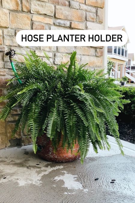 A planter to hold your hose beautifully ❤️ our hose laid in our back porch every year and I always said I would do something about it… and I finally found the perfect solution! 

#LTKSeasonal #LTKhome #LTKstyletip