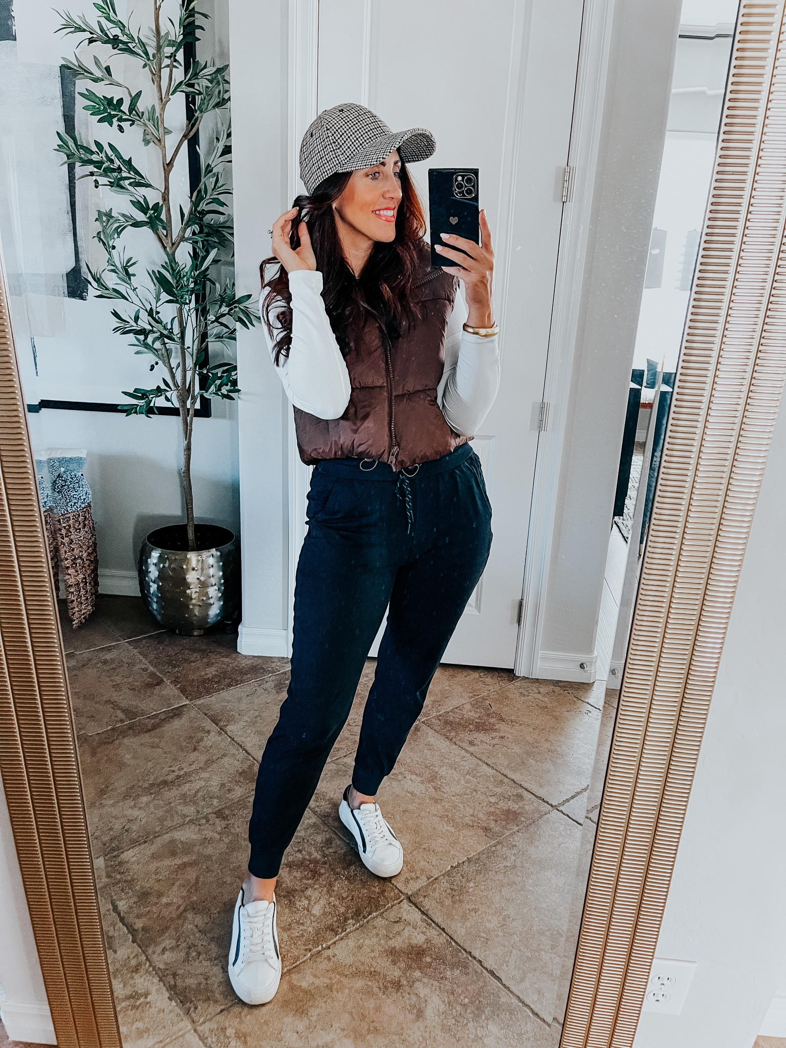 Casual fall outfit idea 🤎 weekend casual style // cropped puffer vest (size small), white ribbed layering tee (size medium) joggers (size small), plaid hat & sneakers 

#LTKsalealert #LTKstyletip #LTKfindsunder50