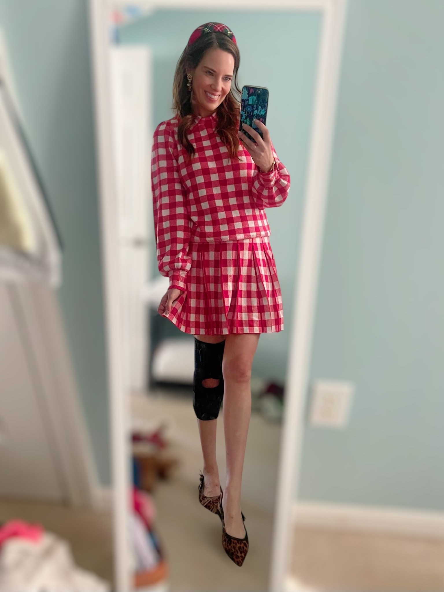 Red Gingham Holiday Set with Leopard Slingbacks 🎄❤️

Festive but easy, this red gingham matching set is such a fun holiday outfit that still feels comfortable and wearable ✨ I’m wearing the long-sleeve gingham top and pleated mini skirt from Walmart for an affordable Christmas outfit that works for holiday parties, family gatherings, church, or seasonal photos 📸🎁 I styled it with leopard slingback flats for a chic pop of print and a padded tartan headband to lean into the classic holiday look 🎀🐆 This budget-friendly holiday outfit is perfect for mixing and matching all season long—wear the gingham top with jeans for casual Christmas errands or style the red plaid mini skirt with a cozy sweater for festive winter outfits 🤍✨

Red gingham set, holiday outfit ideas, Christmas outfit women, festive red outfit, Walmart fashion finds, affordable holiday outfit, gingham matching set, red plaid skirt outfit, holiday party outfit, Christmas family photos outfit, winter holiday style, leopard flats outfit, slingback flats women, tartan headband, Christmas day outfit, budget friendly fashion, petite holiday outfit

#LTKHoliday #LTKFindsUnder100 #LTKFindsUnder50