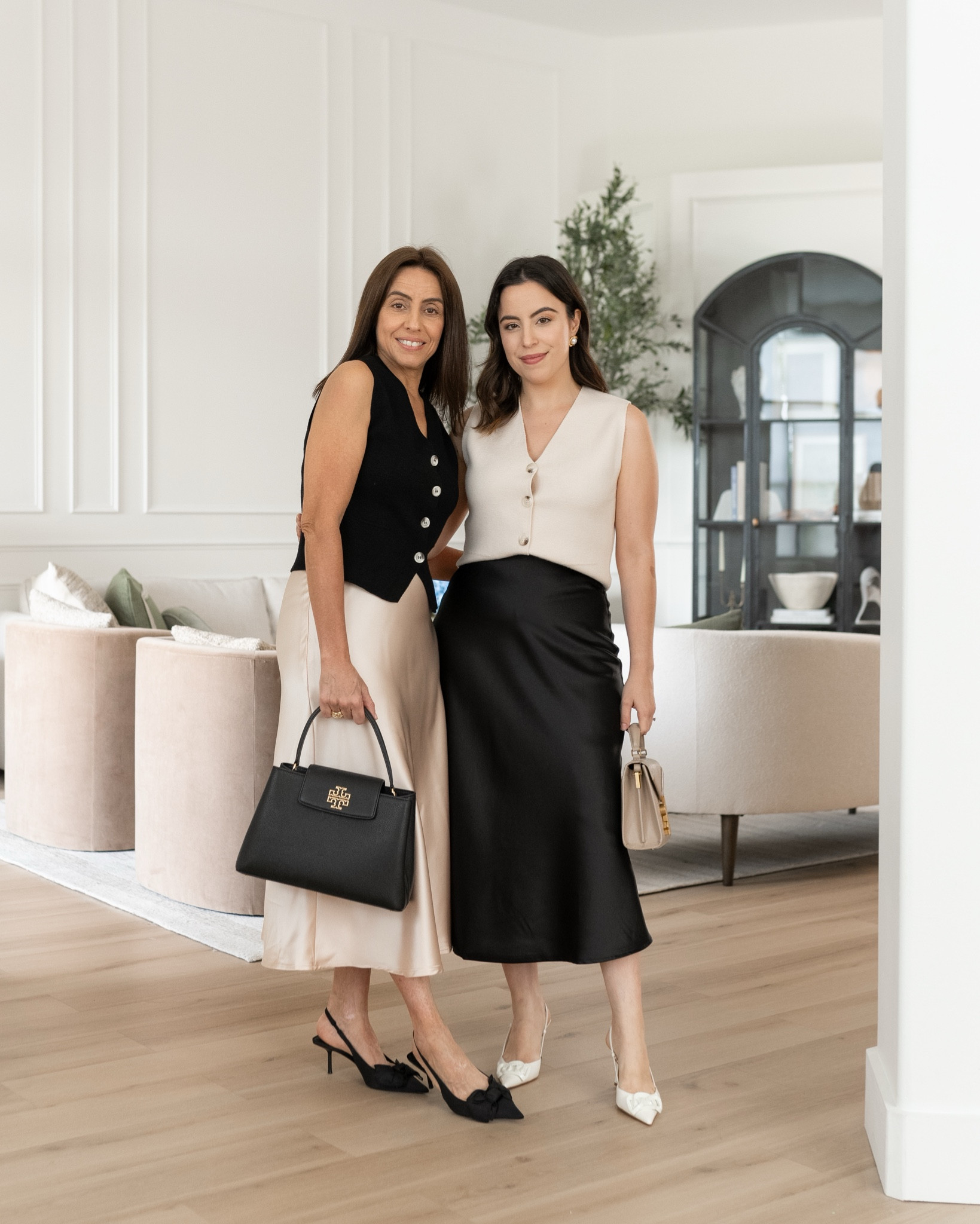 The best satin skirts and knit vests! Wearing size S on both

#LTKOver40 #LTKFindsUnder50 #LTKFindsUnder100