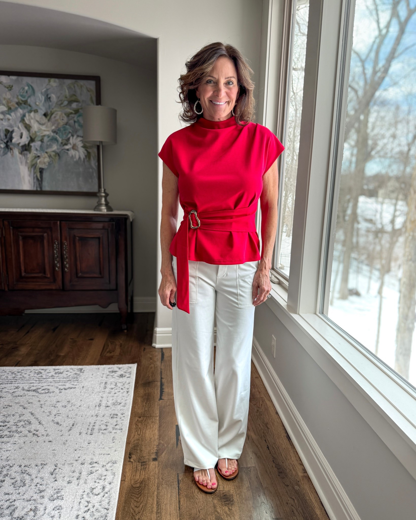 Red belted top outfit for women over 40 ❤️

This bold red belted blouse is one of those statement pieces that instantly elevates simple white pants. The structured waist detail gives shape without feeling tight — and the color? Confidence in fabric form.

I love pairing it with neutral wide-leg pants to let the top shine. Easy enough for dinner out, polished enough for events.

Strong. Chic. Unapologetically feminine.

#casualchic #whitepants #over50fashion