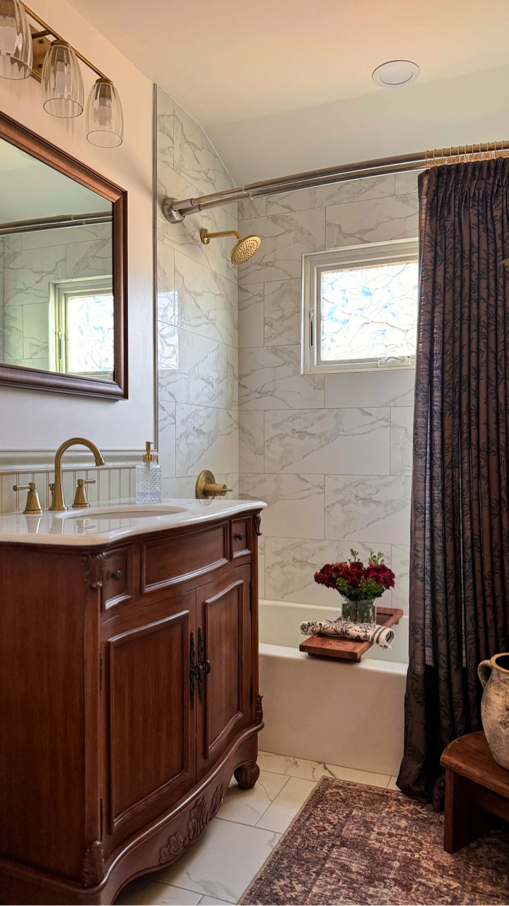 While I’ve definitely minimized my holiday decor this year (because my daughter is quite curious and has to touch everything!), of course I had to add a little holiday cheer in our bathroom! 

This pre-lit wreath is part of the Yorkshire Fir 4-piece collection from @kingofchristmas and is set on a timer to illuminate the space at night. It’s such a pretty touch without taking over our very small bathroom. 

I’m also glad that I did the curtain swap because these chocolate-colored @twopagescurtains bring a warm, cozy feel for Christmastime and the winter months ahead. These are part of the Sarale collection, a line I absolutely adore. 

To shop, tap the link in my bio and story highlights 🥰

#Christmas #ChristmasDecor #Bathroom #BathroomDecor #Home #ChristmasSeason